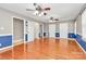 Expansive living room with hardwood floors and multiple doorways at 3311 Camden Rd, Marshville, NC 28103