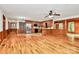 Open-concept layout connecting the kitchen to the living area with hardwood floors at 3311 Camden Rd, Marshville, NC 28103