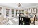 Bright office space with a desk, shelving, three windows, and a comfortable armchair at 3717 Bounty Ct, Matthews, NC 28104