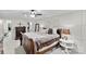 Comfortable main bedroom features a ceiling fan, closet and an ensuite bath at 3717 Bounty Ct, Matthews, NC 28104