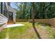 Expansive backyard features a patio and wooden privacy fence, perfect for outdoor enjoyment at 3953 Plainview Rd, Charlotte, NC 28208