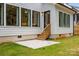 Expansive backyard features a patio and wooden privacy fence, perfect for outdoor enjoyment at 3953 Plainview Rd, Charlotte, NC 28208