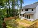 Spacious backyard with a wood fence surrounding the property at 3953 Plainview Rd, Charlotte, NC 28208