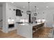 Expansive kitchen boasts modern appliances, a large central island with seating, and an abundance of cabinet space at 3953 Plainview Rd, Charlotte, NC 28208