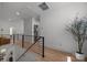 Bright loft with comfortable seating, skylight, and view of stairway at 3953 Plainview Rd, Charlotte, NC 28208