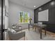 Cozy office space with a dark accent wall, a large window, and comfortable seating at 3953 Plainview Rd, Charlotte, NC 28208
