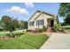 Well-maintained home with lush lawn, landscaped beds, and charming curb appeal at 402 Walnut St, China Grove, NC 28023