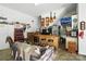Entertaining garage includes full bar, seating area and stairs to upstairs living space at 402 Walnut St, China Grove, NC 28023