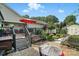 Exterior view of a patio, deck, shed and landscaping in a well maintained backyard at 402 Walnut St, China Grove, NC 28023