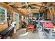 Organized shed interior with a variety of tools, equipment, and storage solutions at 402 Walnut St, China Grove, NC 28023