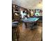 A game room with a pool table, stools, and decorated with various items at 404 Long Shoals Rd, Bessemer City, NC 28016
