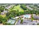 Aerial view of a community featuring a swimming pool, tennis court, and manicured green space at 4079 Murray St, Fort Mill, SC 29707
