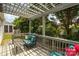 Inviting outdoor deck with comfortable seating and a charming pergola at 4079 Murray St, Fort Mill, SC 29707