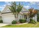 Charming home with gray siding, manicured lawn, two-car garage, and inviting front entryway at 4079 Murray St, Fort Mill, SC 29707