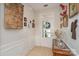 Welcoming foyer with decorative tapestry, tiled floor, and front door view at 4079 Murray St, Fort Mill, SC 29707