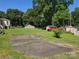 Large backyard with mature trees and a detached garage at 412 Ridge St, Stanley, NC 28164
