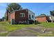 Charming brick home with a spacious yard and detached outbuilding at 412 Ridge St, Stanley, NC 28164