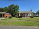 Attractive brick home with a covered entrance and neat landscaping at 412 Ridge St, Stanley, NC 28164