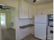 Bright kitchen with white cabinets and appliances at 412 Ridge St, Stanley, NC 28164