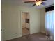 Living room showing doorway to kitchen and neutral carpeting at 412 Ridge St, Stanley, NC 28164