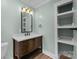 Bathroom features a dark wood vanity with white countertops and modern fixtures at 435 Stirewalt Rd, China Grove, NC 28023