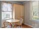 Breakfast nook with built in cabinet and view to the outdoors at 435 Stirewalt Rd, China Grove, NC 28023