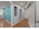 Hallway with hardwood floors and access to other rooms at 435 Stirewalt Rd, China Grove, NC 28023