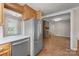 Spacious kitchen with stainless steel refrigerator and view into living room at 435 Stirewalt Rd, China Grove, NC 28023
