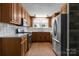 Traditional kitchen with oak cabinets and stainless steel appliances at 435 Stirewalt Rd, China Grove, NC 28023