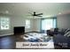 Spacious Gathering room with ample natural light, hardwood flooring, and stylish, modern decor at 4429 Dawnwood Dr, Gastonia, NC 28056