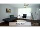 Cozy living room with hardwood floors, bright windows, and stylish furnishings at 4429 Dawnwood Dr, Gastonia, NC 28056