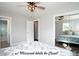Spacious main bedroom with mirrored walk-in closet and a ceiling fan for added comfort at 4429 Dawnwood Dr, Gastonia, NC 28056