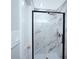 Modern shower features marble-style tile, a glass enclosure, and contemporary fixtures at 4429 Dawnwood Dr, Gastonia, NC 28056