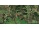 Aerial view of a homesite on a wooded lot in a rural area at 4688 Taxahaw Rd, Lancaster, SC 29720