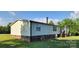 Exterior view of home featuring a well-maintained yard and covered porch at 4688 Taxahaw Rd, Lancaster, SC 29720