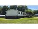 Back exterior of house with siding and brick foundation at 4688 Taxahaw Rd, Lancaster, SC 29720