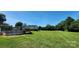 Backyard featuring an above ground pool, wooden deck, and large yard at 4688 Taxahaw Rd, Lancaster, SC 29720