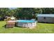 Backyard featuring an above ground pool and wooden deck at 4688 Taxahaw Rd, Lancaster, SC 29720