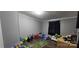 Cozy bedroom with hardwood floors, toys, and ample natural light at 4688 Taxahaw Rd, Lancaster, SC 29720