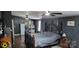 Spacious bedroom featuring wood floors, a large bed, and decor at 4688 Taxahaw Rd, Lancaster, SC 29720