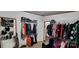 Organized closet with hanging racks and shoe storage at 4688 Taxahaw Rd, Lancaster, SC 29720