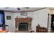 Living room highlighting a fireplace with a wooden mantel at 4688 Taxahaw Rd, Lancaster, SC 29720