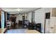 Open-concept living space with fireplace, wood-look flooring, and dining area at 4688 Taxahaw Rd, Lancaster, SC 29720