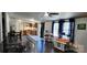 Open floor plan featuring fireplace, dining area, modern flooring and natural light at 4688 Taxahaw Rd, Lancaster, SC 29720