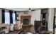 Cozy living room with a brick fireplace and modern flooring at 4688 Taxahaw Rd, Lancaster, SC 29720