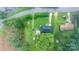 An aerial view of a property featuring a well-maintained lawn, mature trees, and convenient road access at 5083 Fleetwood Dr, Hickory, NC 28602