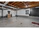 Unfinished basement with exposed ceiling, laundry area with washer and dryer hookups at 5083 Fleetwood Dr, Hickory, NC 28602