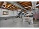 Spacious basement featuring exposed ceiling and potential for customization at 5083 Fleetwood Dr, Hickory, NC 28602