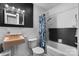 Cozy bathroom featuring updated fixtures, with a shower and tub combination at 5083 Fleetwood Dr, Hickory, NC 28602