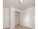 Carpeted bedroom view featuring a bi-fold closet in a naturally lit space at 517 Dutch Ave, Mount Holly, NC 28120